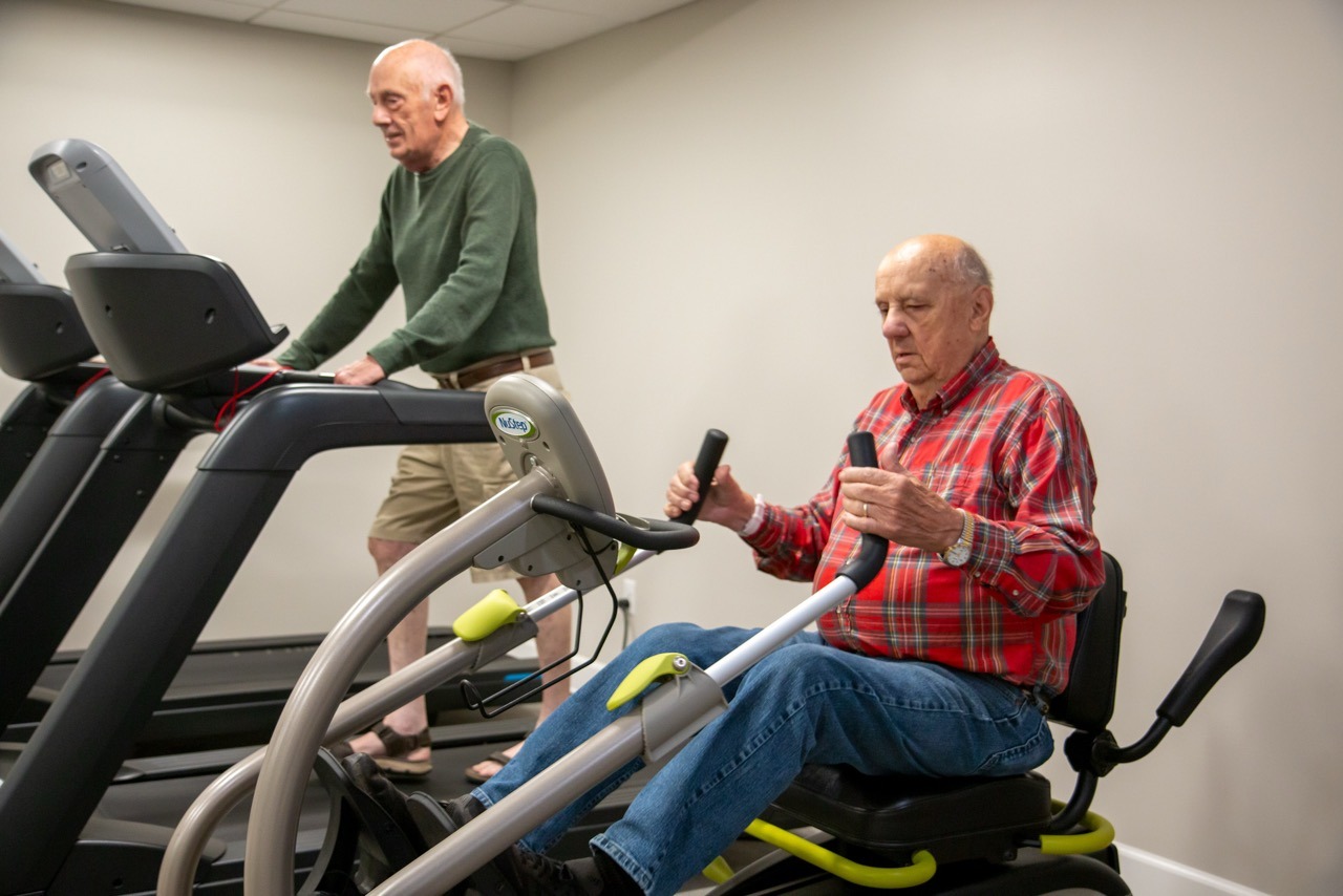Residents utilizing the onsite exercise machines at Rivertown Ridge in Wyoming, MI.